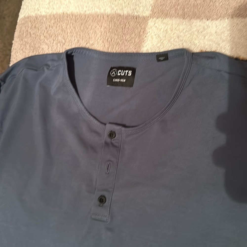 Cuts Clothing Long Sleeve Henley,  White is Elongated Hem,  Blue is Curved Hem
